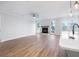 Bright living space with wood floors, a cozy fireplace, and easy access to the outdoors at 355 Wappoo Trace Ln, Summerville, SC 29486