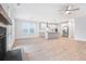 Open living space with wood floors, stainless steel appliances, and modern pendant lights at 355 Wappoo Trace Ln, Summerville, SC 29486
