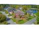 Aerial view of a two-story brick home with a well-manicured lawn and lush greenery at 3584 Somerset Hills Ct, Mount Pleasant, SC 29466