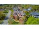 Aerial shot of a stately brick home with meticulous landscaping and mature trees at 3584 Somerset Hills Ct, Mount Pleasant, SC 29466