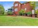 Spacious backyard featuring stairs to a screened porch and walkout basement at 3584 Somerset Hills Ct, Mount Pleasant, SC 29466