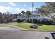 Upscale clubhouse showcasing a stately entrance with an American flag at 3584 Somerset Hills Ct, Mount Pleasant, SC 29466