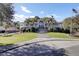 Clubhouse featuring a grand entrance, landscaped grounds, and ample parking at 3584 Somerset Hills Ct, Mount Pleasant, SC 29466