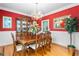 Formal dining room featuring hardwood floors, a chandelier, and a large wooden table with seating for six at 3584 Somerset Hills Ct, Mount Pleasant, SC 29466