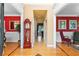 Inviting foyer with hardwood floors, grand grandfather clock, and views into adjacent living spaces at 3584 Somerset Hills Ct, Mount Pleasant, SC 29466