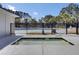 A sunken hot tub provides a luxurious retreat with a view of the community swimming pool at 3584 Somerset Hills Ct, Mount Pleasant, SC 29466