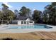 Community pool with an adjacent building at 3584 Somerset Hills Ct, Mount Pleasant, SC 29466
