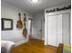Bedroom with hardwood floors and ample closet space for storage, offering a cozy retreat at 402 N Hickory Street St, Summerville, SC 29483