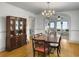 Elegant dining room featuring hardwood floors, china cabinet, and access to living room at 402 N Hickory Street St, Summerville, SC 29483