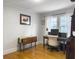 Comfortable office with hardwood floors, bright windows, and ample workspace for productivity at 402 N Hickory Street St, Summerville, SC 29483