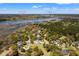 Stunning aerial view of waterfront property at 4029 Gift Blvd, nestled among lush trees and scenic waterways at 4029 Gift Blvd, Johns Island, SC 29455