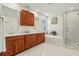 Luxurious bathroom with double sinks, marble countertops, tub, and a glass-enclosed shower at 4029 Gift Blvd, Johns Island, SC 29455