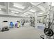 A spacious workout room with mirrored walls, ceiling fans, padded floors, and an array of exercise equipment at 4029 Gift Blvd, Johns Island, SC 29455