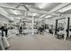 A spacious workout room with mirrored walls, ceiling fans, padded floors, and an array of exercise equipment at 4029 Gift Blvd, Johns Island, SC 29455