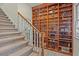 Hallway with carpeted stairs and built-in bookshelves displaying collectible figurines and artifacts at 4029 Gift Blvd, Johns Island, SC 29455
