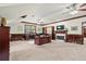Spacious office with custom wood trim, large desk, fireplace, and built-in cabinets at 4029 Gift Blvd, Johns Island, SC 29455
