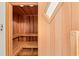 An indoor wooden sauna featuring wooden benches and a small window on the door at 4029 Gift Blvd, Johns Island, SC 29455