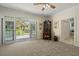 Comfortable sitting room with French doors leading to a deck, and a large china cabinet at 4029 Gift Blvd, Johns Island, SC 29455