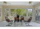 A sunroom area showcasing decorative wallpaper, and abundant natural light at 4029 Gift Blvd, Johns Island, SC 29455