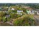 Aerial view of the property showing the surrounding trees and landscape at 4060 S Rhett Ave, North Charleston, SC 29405