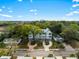 Aerial view of townhomes features modern design, private driveways, with mature trees at 4060 S Rhett Ave, North Charleston, SC 29405