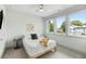 Bedroom with a large window offering views of the neighborhood at 4060 S Rhett Ave, North Charleston, SC 29405