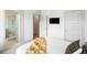 Bedroom featuring ensuite bath with frameless shower and neutral decor at 4060 S Rhett Ave, North Charleston, SC 29405