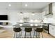 Contemporary kitchen with sleek island, stainless steel appliances, and modern pendant lighting at 4060 S Rhett Ave, North Charleston, SC 29405
