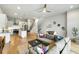 Open concept living space with hardwood floors, and seamless flow into kitchen and dining area at 4060 S Rhett Ave, North Charleston, SC 29405