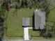 Aerial view of a home with a sprawling lawn and a detached garage at 4235 Royal Harbor Rd, Hollywood, SC 29449
