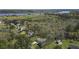 Aerial view of a home surrounded by lush trees and an expansive waterway at 4235 Royal Harbor Rd, Hollywood, SC 29449