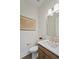Half bathroom featuring modern vanity and fixtures and an elegant mirror at 4235 Royal Harbor Rd, Hollywood, SC 29449