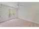 Bright bedroom featuring neutral carpet, recessed lighting, a ceiling fan, and doors leading to a private balcony at 4235 Royal Harbor Rd, Hollywood, SC 29449