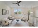 Charming bonus room features a teepee, two chairs, and large windows providing ample natural light at 4235 Royal Harbor Rd, Hollywood, SC 29449