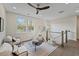 Charming bonus room features a teepee, two chairs, and large windows providing ample natural light at 4235 Royal Harbor Rd, Hollywood, SC 29449