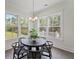 Breakfast nook features large windows providing backyard views and natural light at 4235 Royal Harbor Rd, Hollywood, SC 29449