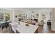 Open floor plan showcases living room with fireplace and large kitchen with island sink at 4235 Royal Harbor Rd, Hollywood, SC 29449