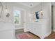 Bright bathroom featuring double sinks, ample natural light, and modern fixtures at 4310 Stonehouse Cir, Awendaw, SC 29429