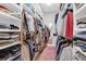 Organized walk-in closet with ample storage space, shelving, and hanging racks at 4310 Stonehouse Cir, Awendaw, SC 29429