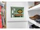 Custom closet safe, framed with white trim for secure storage at 4310 Stonehouse Cir, Awendaw, SC 29429