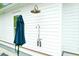 Convenient outdoor shower with classic fixtures and a neutral color palette, perfect for rinsing off after a swim at 4310 Stonehouse Cir, Awendaw, SC 29429