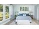 Inviting bedroom with natural light, a comfortable bed, and neutral tones with calming decor at 5104 Coneflower Ct, Johns Island, SC 29455