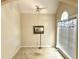 Well-lit bedroom with a ceiling fan, vaulted ceiling, large window, and neutral walls at 5182 Forest Oaks Dr, Hollywood, SC 29449