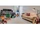 Bedroom featuring recording equipment, guitars, and a cozy couch at 5560 Alpine Dr, Summerville, SC 29483