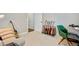 Bedroom featuring wall of guitars, cozy couch, and green rolling chair at 5560 Alpine Dr, Summerville, SC 29483