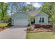 Well maintained single story home with attached two car garage and mature landscaping at 5560 Alpine Dr, Summerville, SC 29483