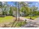 Charming single-story home with a well-manicured lawn and a lovely garden at 5560 Alpine Dr, Summerville, SC 29483