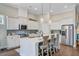 Bright and airy kitchen featuring an island with seating and stainless steel appliances at 5560 Alpine Dr, Summerville, SC 29483