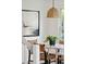 Stylish dining room featuring a marble table and decorative pendant light at 5573 Betty Ct, North Charleston, SC 29418