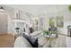 Airy living room showcasing a staircase, neutral palette, and open layout at 5573 Betty Ct, North Charleston, SC 29418